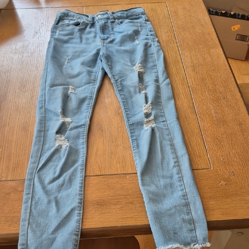 Distressed Blue Jeans